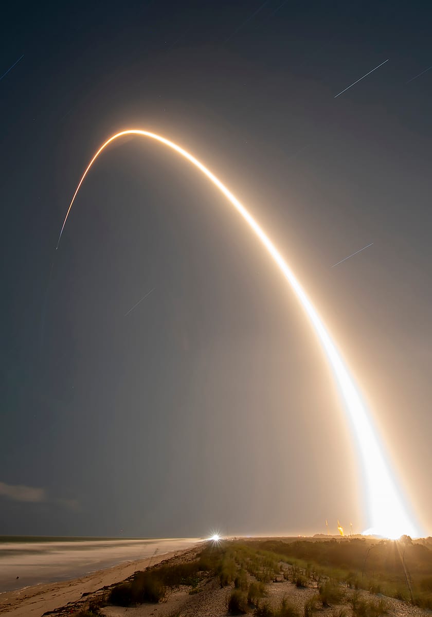 A long exposure photo of B1058 with the Starlink Group 6-26 mission. ©SpaceX
