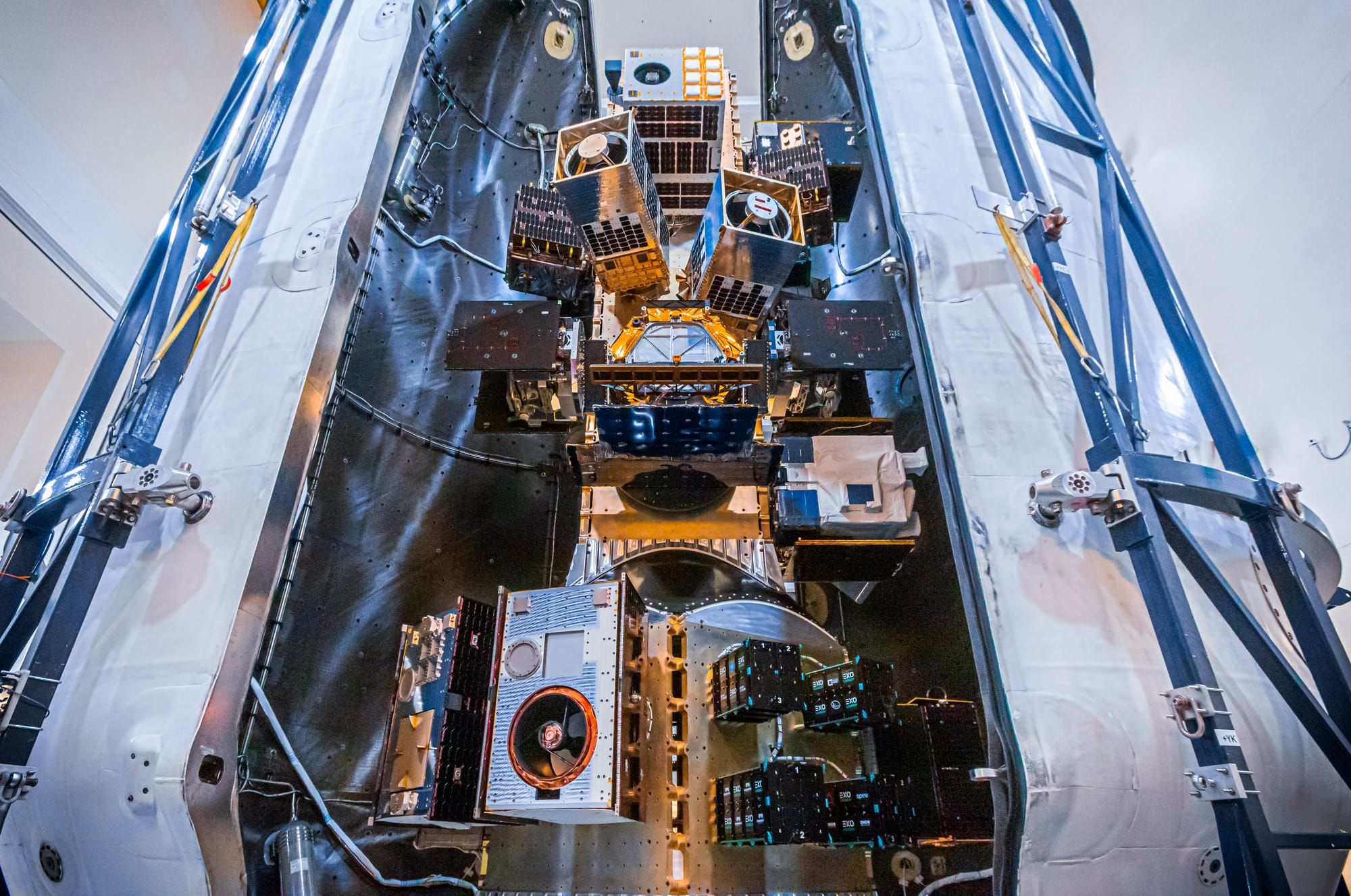 The payloads of the Transporter-10 mission during encapsulation into Falcon 9's fairing. ©SpaceX