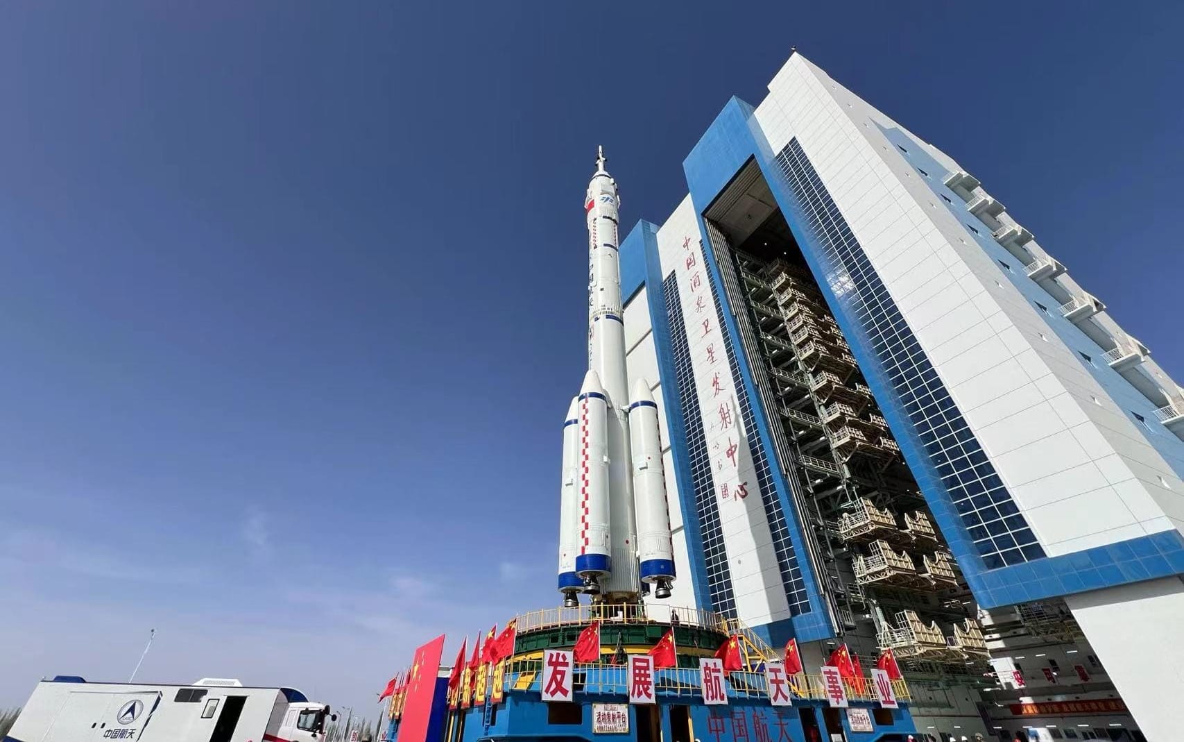 The Long March 2F for the Shenzhou-18 mission during rollout to its launch pad. ©China Manned Space Agency/Xinhua