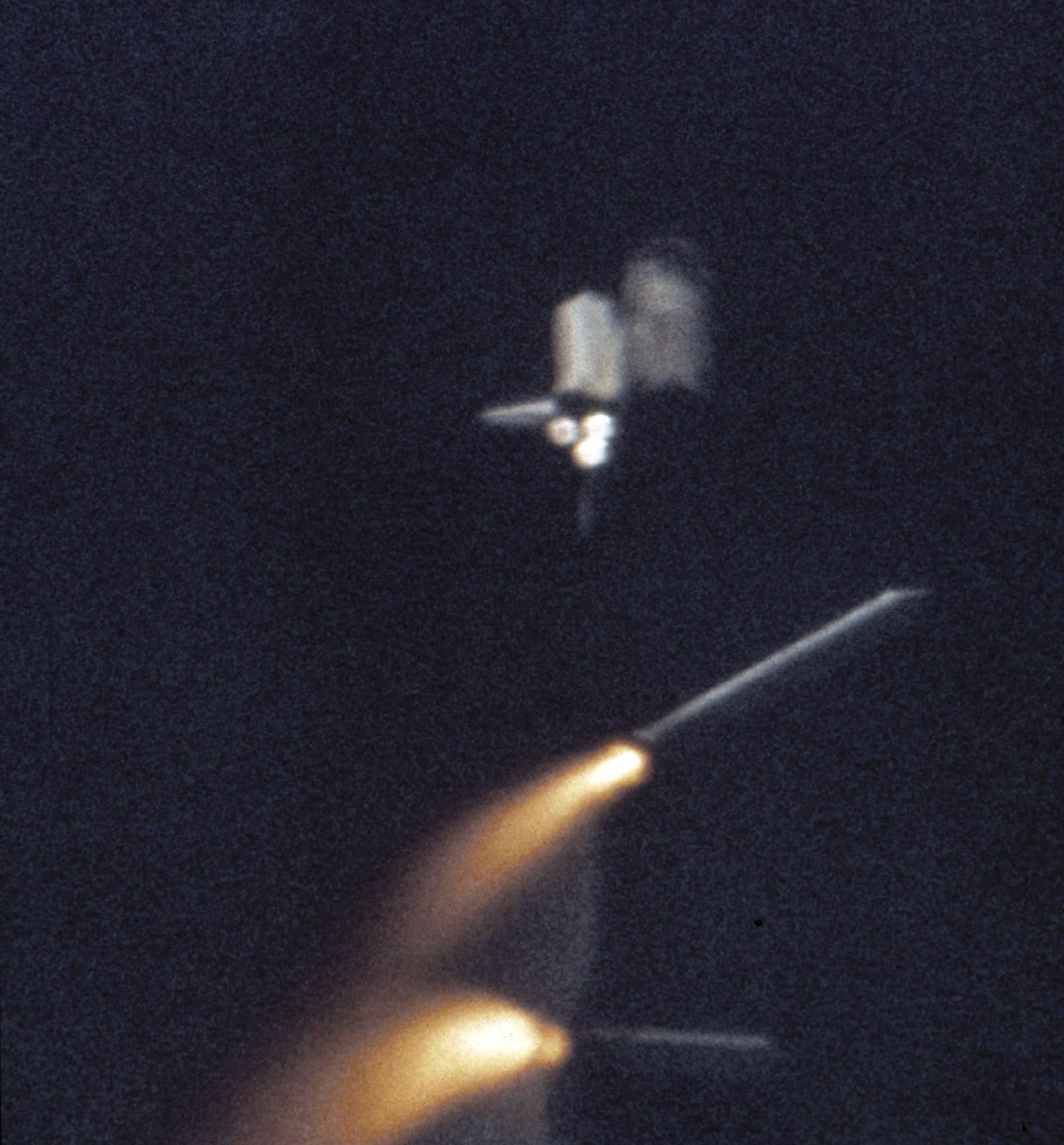 Columbia during ascent for STS-1 shortly after booster separation. ©NASA