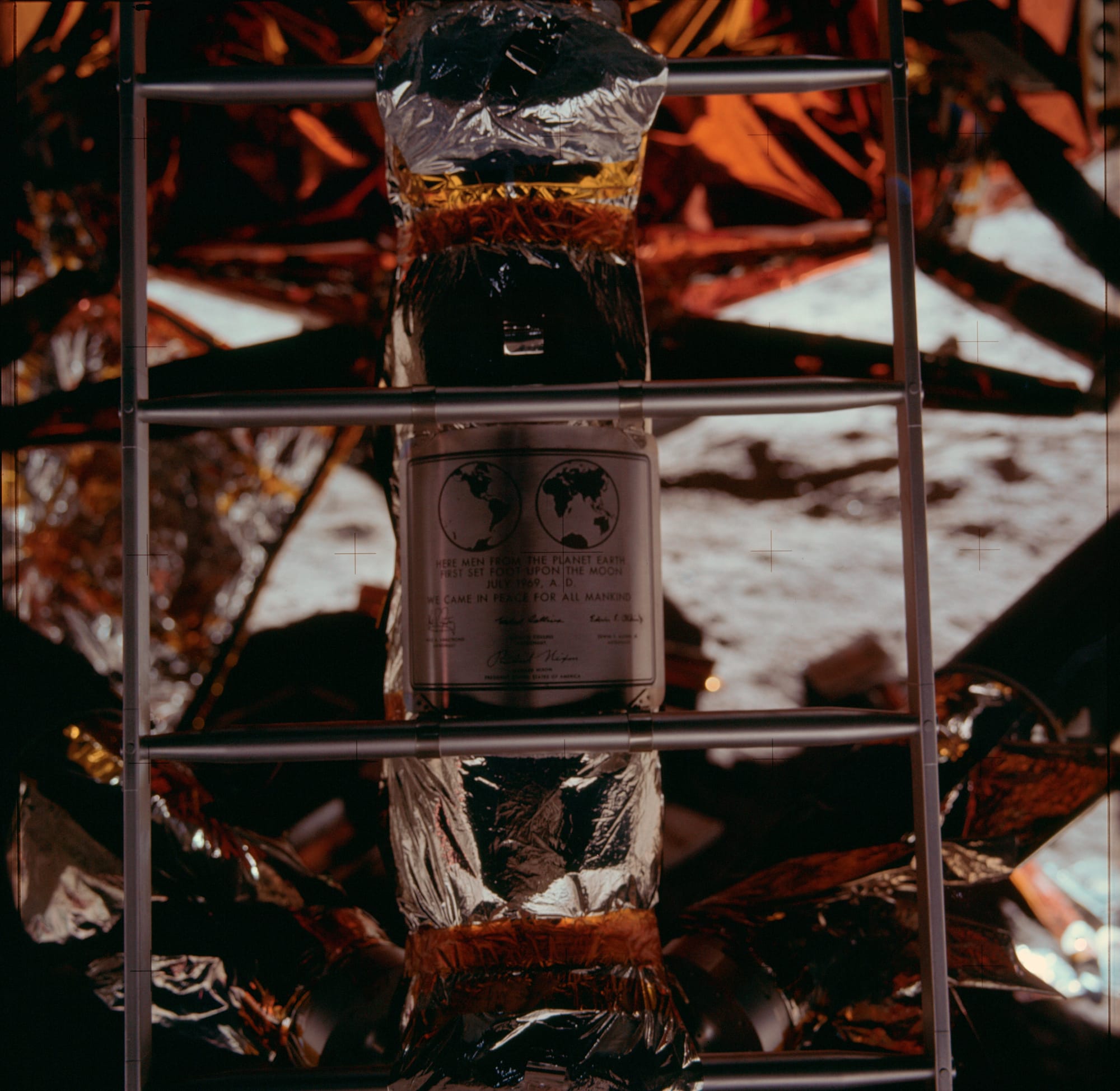 The commemorative plaque attached to the Apollo 11 Lunar Module celebrating the first time humans stepped foot on the Moon's surface. ©NASA