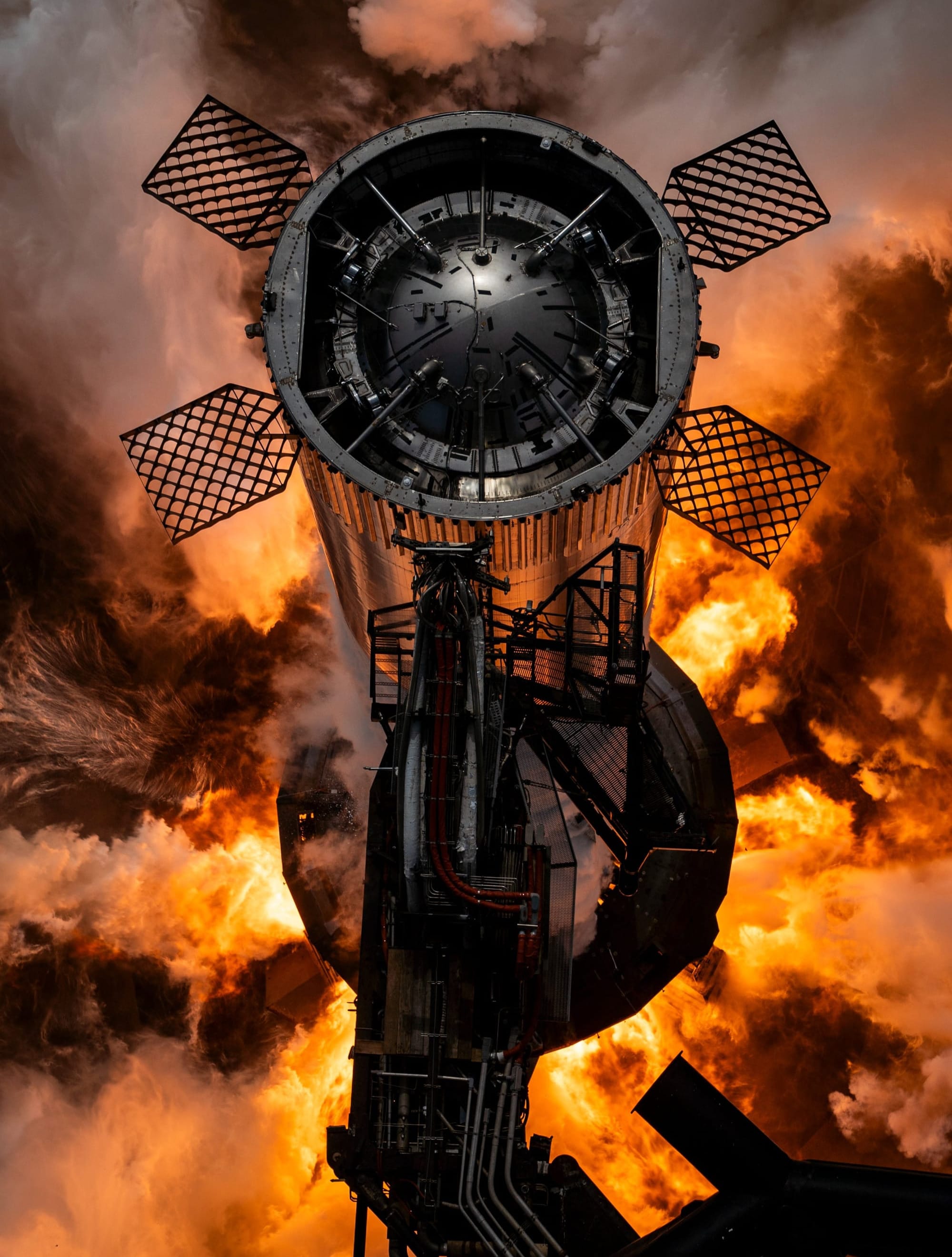 Booster 12 during its static fire on the orbital launch mount. ©SpaceX