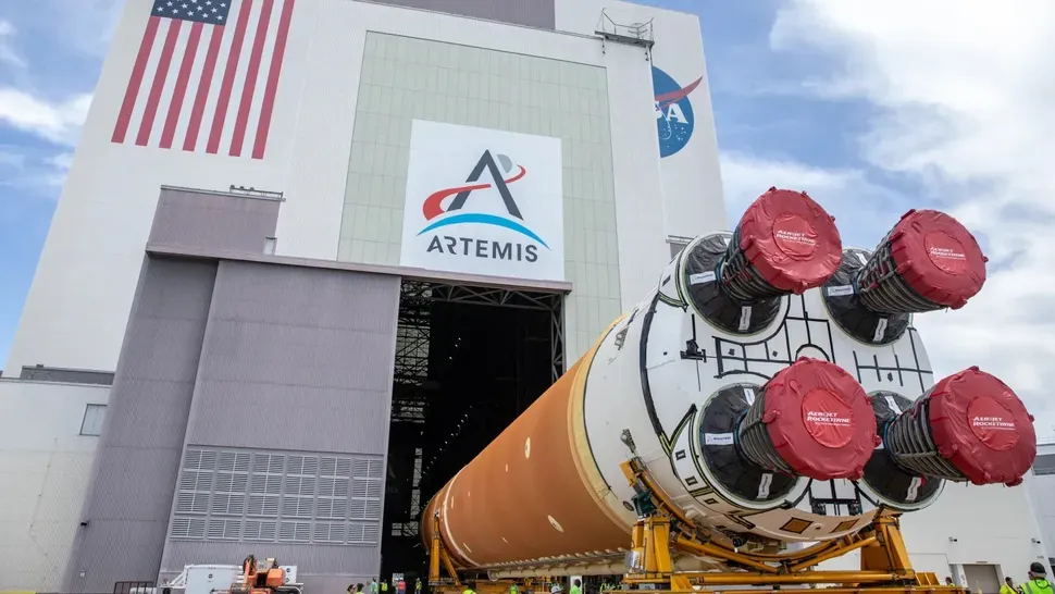 The core stage of the Space Launch System for Artemis II being moved into NASA's VAB at Kennedy Space Center. ©Isaac Watson/NASA