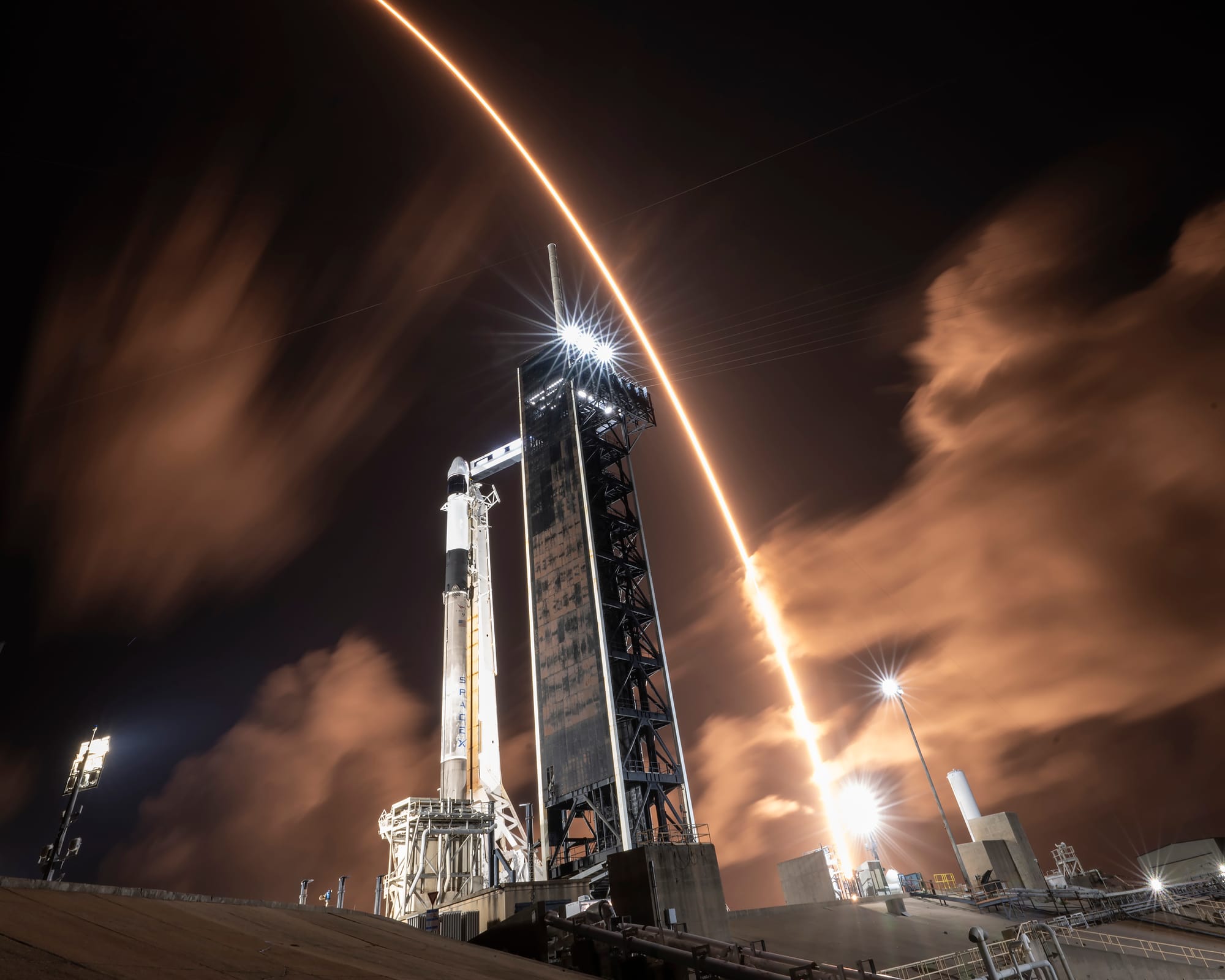 A long exposure photo of Falcon 9 during ascent for the Starlink Group 8-10 mission, seen from Launch Complex 39A with the Polaris Dawn mission prepared for launch. ©SpaceX