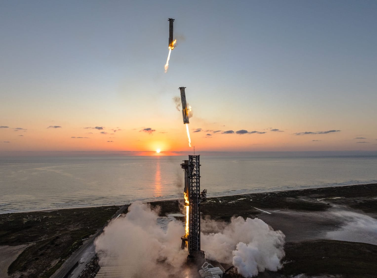 Super Heavy Booster 12 being caught by the launch towers 'chopsticks' on October 13th. ©SpaceX