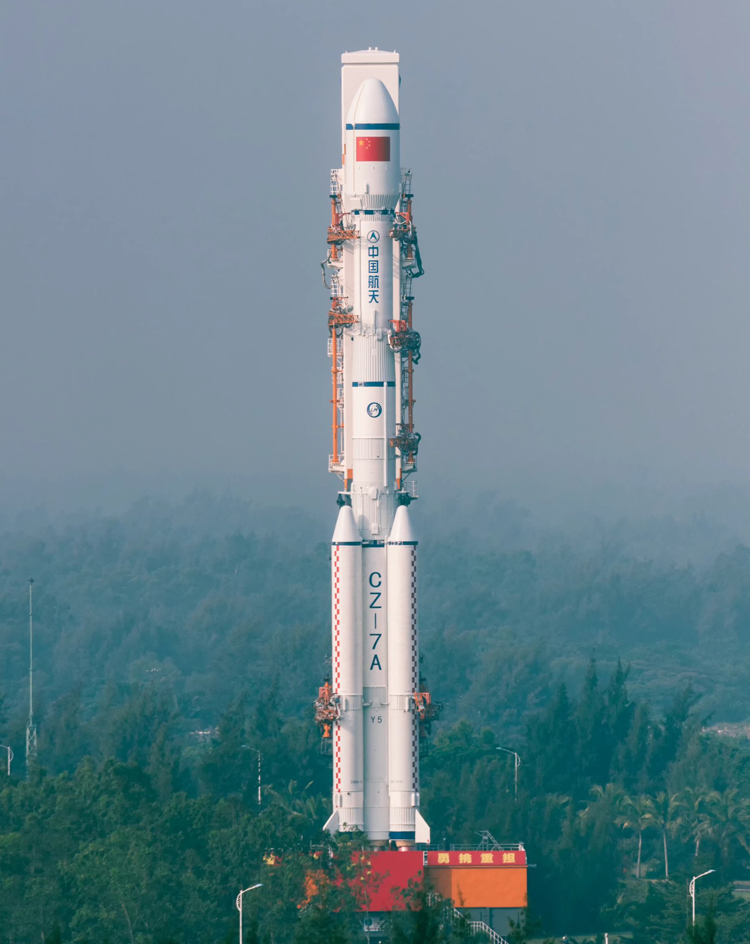 A Long March 7A during rollout at the Wenchang Space Launch Site.