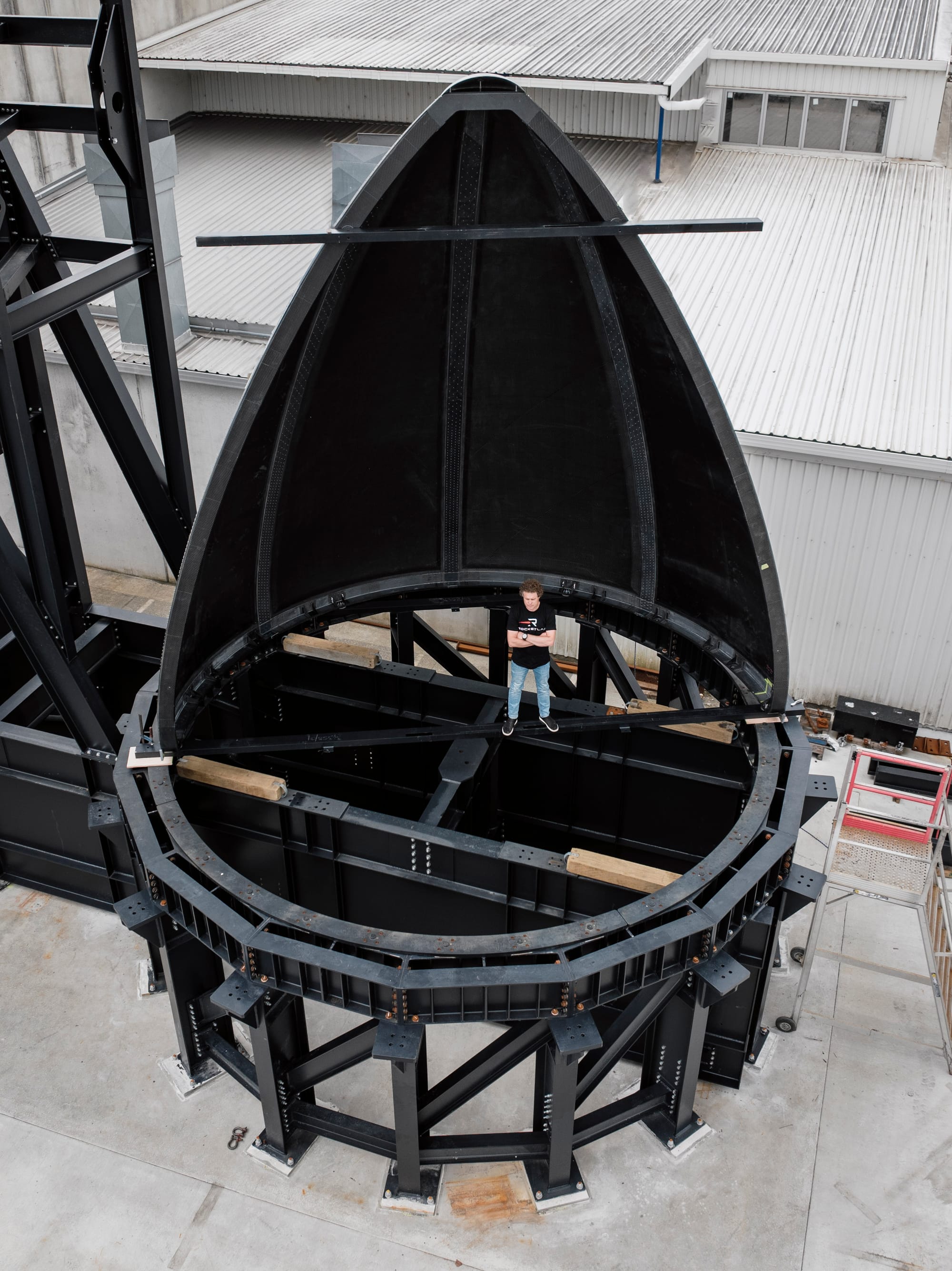 One of Neutron's fairing halves with Peter Beck, Rocket Lab's CEO, for scale. ©Rocket Lab