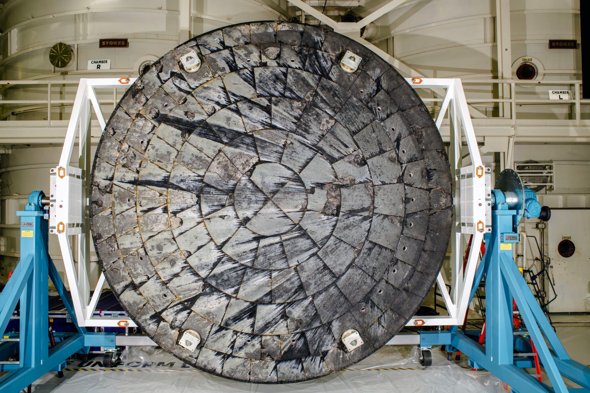 The Orion spacecraft's heat shield after the Artemis I mission at the Kennedy Space Center. ©NASA