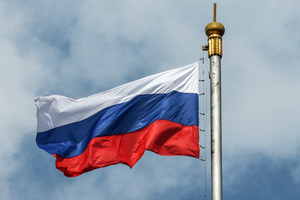 The flag of Russia flying in the wind.