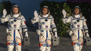 Left to right; Tang Hongbo, Nie Haisheng and Liu Boming in their spacesuits ahead of the launch of Shenzhou-12.