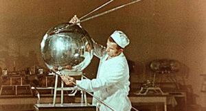 An engineer working on the Sputnik-1 spacecraft.